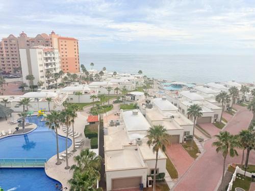 an aerial view of a resort near the ocean at Las Palmas 4BR 4BA Penthouse OV 701 in Campo del Medio