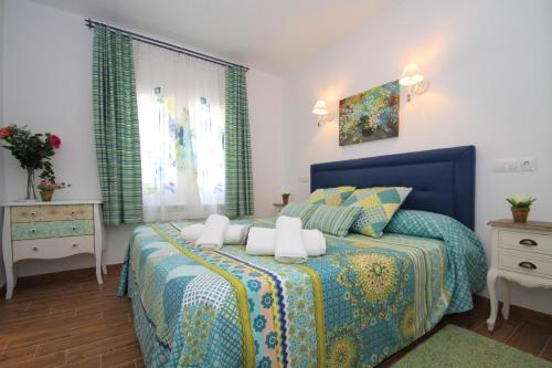 Postel nebo postele na pokoji v ubytování ARENDA Villa Camila Pino Alto