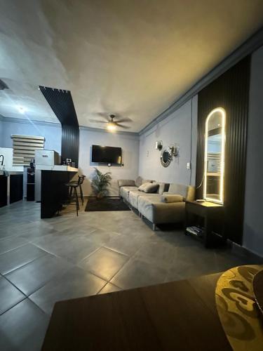 a living room with a couch and a table at Departamento Mateos 503 in Ciudad Acuña