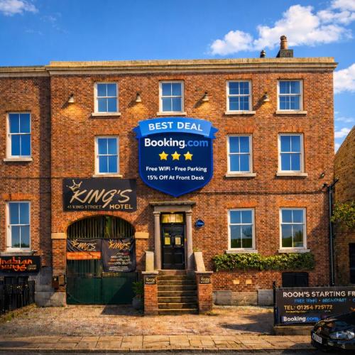 a brick building with a sign that reads best deal boxing gym at BEST DEAL - Kings Hotel in Blackburn