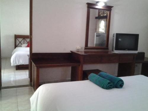 Postel nebo postele na pokoji v ubytování Hotel SeaSide lovina