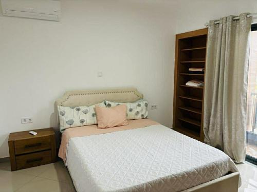 Llit o llits en una habitació de Holiday AP TF 2