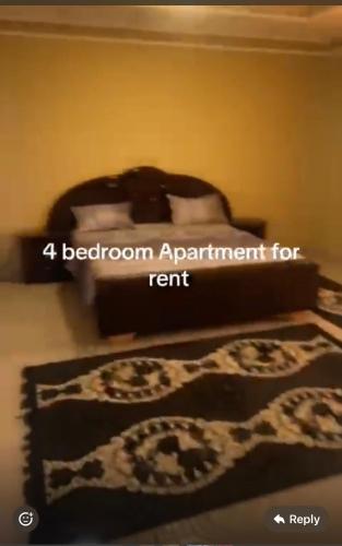 a bedroom with a bed with a platform appointment for rent at BUSUBALA Resident in Yundum
