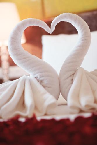 a cake with a heart made out of fondant at Dorsett Putrajaya in Putrajaya