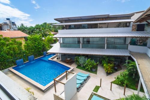 an aerial view of a villa with a swimming pool at Brisa do Mar Praia Hotel in Morro de São Paulo