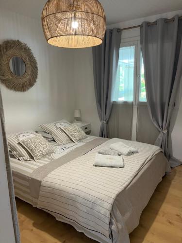 Llit o llits en una habitació de Le Pelican