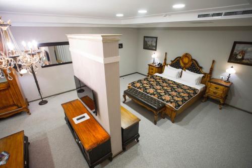 an aerial view of a bedroom with a bed at Boutique Hotel Baku in Baku