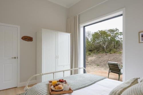 Llit o llits en una habitació de The Dunes