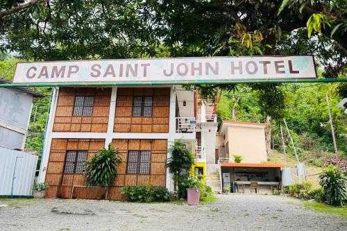 a building with a sign that reads camp sant join hotel at Camp Saint John Hotel La Union in San Juan