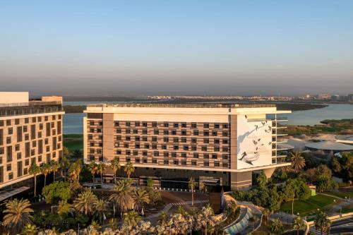 an overhead view of a building with a river in the background at Yas Plaza Bay by IHG in Abu Dhabi