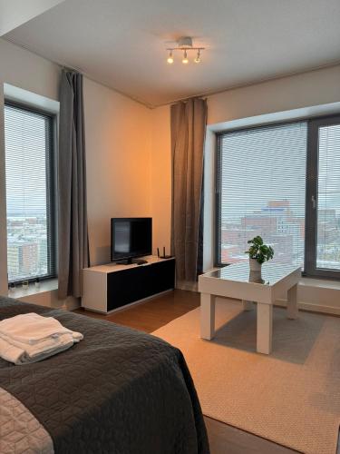 Foto Kotimaailma Apartments - Upea yläkerroksen studio - Itsenäisyydenkatu 2