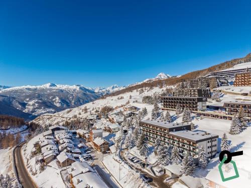 an aerial view of a resort in the snow at Hotiday Sestriere Ski Run in Sestriere