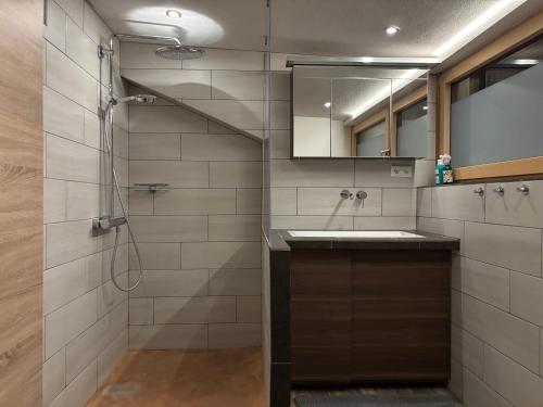 a bathroom with a shower and a sink at Ferienwohnung Philipp in Leutasch