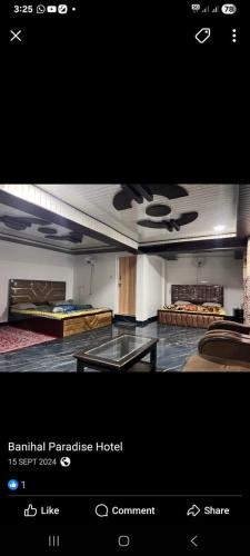 a view of a hotel room with a table and chairs at Paradise Banihal Hotel in Banihāl
