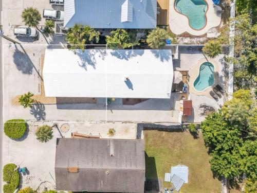 an overhead view of a building with a large white billboard at Island Gem A home in Anna Maria