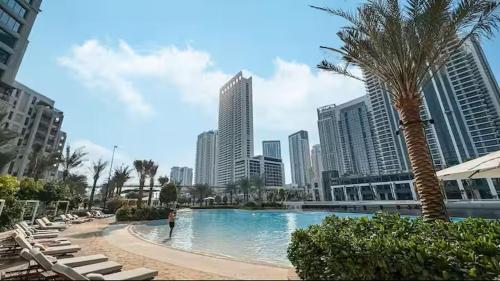 Vogue Vacation Homes, Creek Beach Rosewater Waterfront Living close to Downtown, Burj Khalifa and Dubai mall, Two Bedroom Apartment with Balcony and Vibrant Community View, Private Manmade Beach, Access to all Amenities