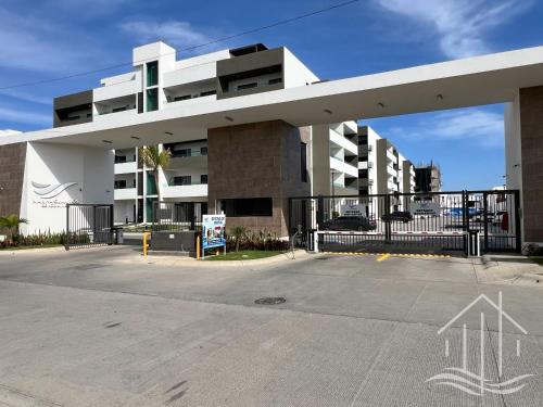 an empty parking lot in front of a building at New-Promo-2 Queen Beds-Near Beach-Poolside-Sleep 6 in Mazatlán