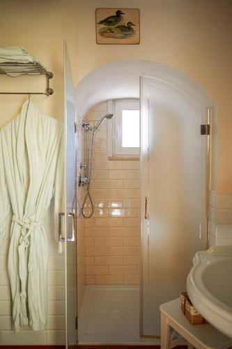 a bathroom with a shower and a sink at GOLA Dimora storica in Cerignola