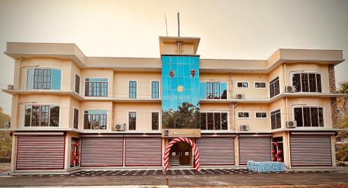 a large building with an arch in front of it at 3BHK Villa 15 min Thommankuthu Falls Groups in Thodupuzha