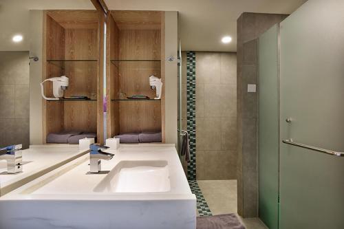 Ett badrum på Ibis Styles Bogor Raya