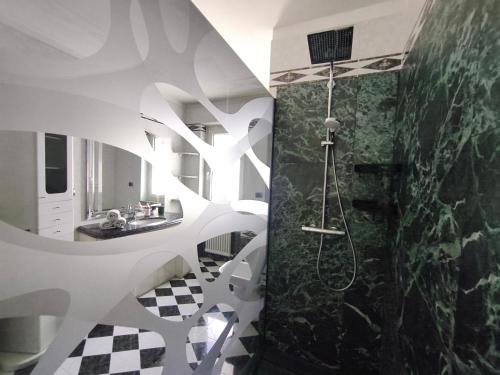 a bathroom with a shower and a sink at Superior Apartments Giovannini in Fai della Paganella