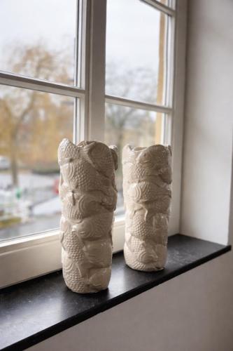 two towels are sitting on a window sill at Boutique appartementen Théodore in Valkenburg