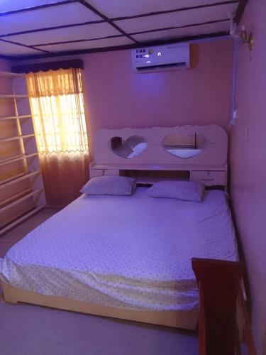 Llit o llits en una habitació de Cozy Flat Spur Rood