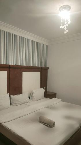 a bedroom with a bed with a pillow on it at Sharm life 106 in Sharm El Sheikh