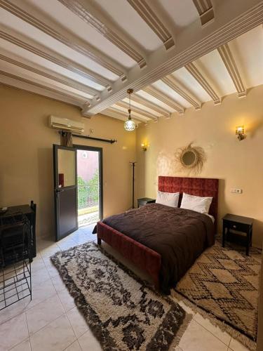 Llit o llits en una habitació de Hôtel Zaghro