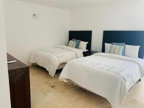Llit o llits en una habitació de Coson Bay