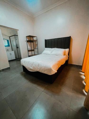 En eller flere senge i et værelse på La Savane