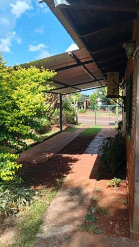 a covered walkway outside of a building at Casa Paganelli Germano in Aristóbulo del Valle