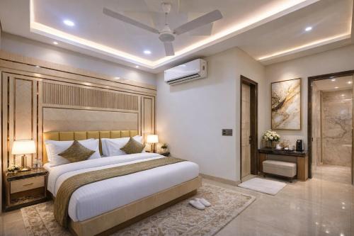 a bedroom with a large bed in a room at Hotel New Frontier, City Centre - Walk in Chandni Chowk & OLD Delhi Station in New Delhi