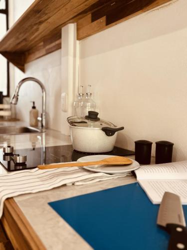 a kitchen counter with a bowl on top of it at Casitas Amarillas in Uvita