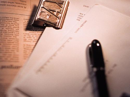 a pen sitting on top of a piece of paper at APA Hotel Kamataeki-Higashi in Tokyo