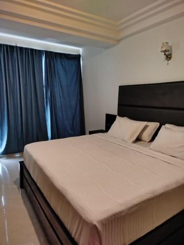 Llit o llits en una habitació de Hotel Indigo