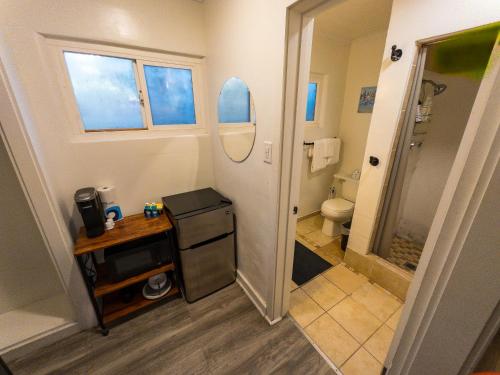 a small bathroom with a toilet and a sink at The Chalet at Kings Beach Unit 6 in Kings Beach