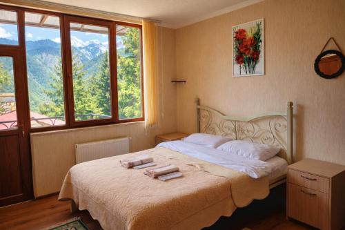 Llit o llits en una habitació de Hotel forest echo