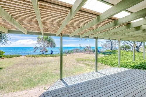 an empty porch with a view of the ocean at 1 Coolanblue Avenue Innes Park in Pemberton