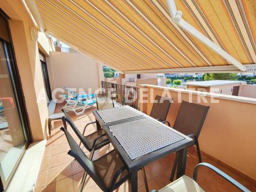 Appartement tranquille avec piscine commune près du centre