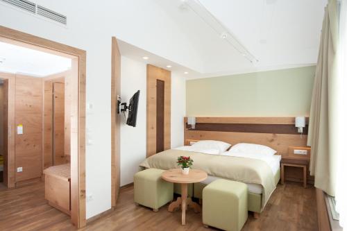 Posteľ alebo postele v izbe v ubytovaní Hotel zur Post