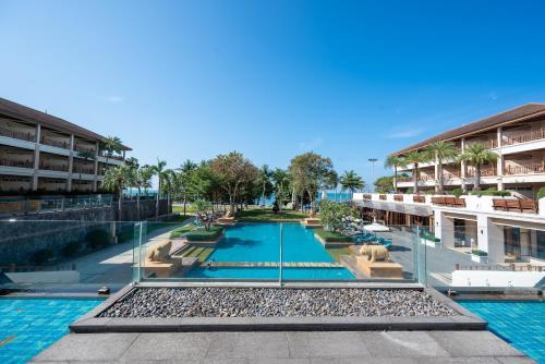 an image of a swimming pool at a resort at The Heritage Pattaya Beachfront Resort in Pattaya South
