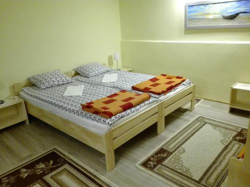 Cama o camas de una habitación en Pokój gościnny w Zakopanem