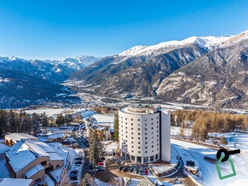 an aerial view of a resort in the mountains at Hotiday Sauze Torre in Sauze dʼOulx