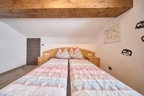 a bedroom with a large bed in a room at Apartment Wenger Leogang in Leogang