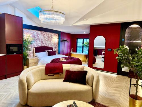 a hotel room with a bed and a couch at Hylton House in Birmingham