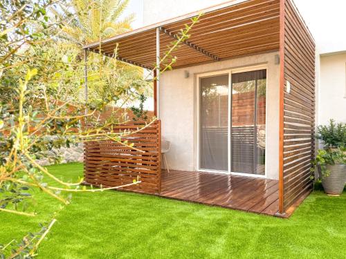 Jardí fora de Stacey’s Stylish studio