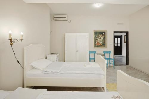 Llit o llits en una habitació de Mia Casa