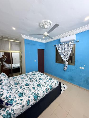 En eller flere senge i et værelse på Résidence Mp