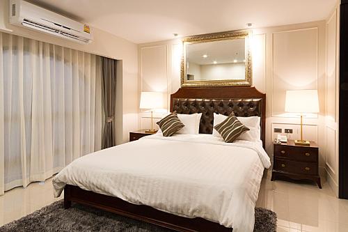 Llit o llits en una habitació de SN Plus Hotel - SHA Plus